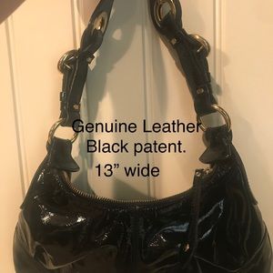 Black genuine leather Francesco Biasia hand bag.